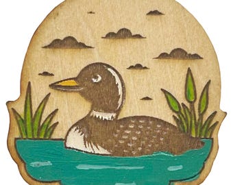 Pato en el agua - Pin de madera e imán
