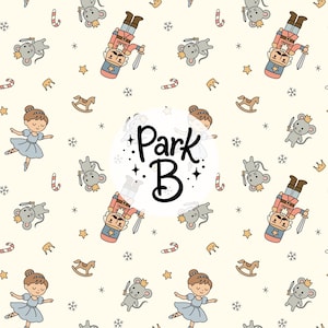 Puede incluir: Un patrón de tela color crema con dibujos de cascanueces, bailarinas con vestidos azules, ratones con coronas y espadas, caballitos de madera, bastones de caramelo, estrellas y copos de nieve. El centro muestra el texto negro Park B.