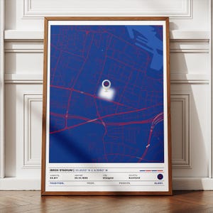 May include: A framed print featuring a detailed map in red lines over a blue background. The map highlights a stadium location, with text at the bottom reading "IBROX STADIUM" and additional details about the stadium's capacity, opening date, city, and country.