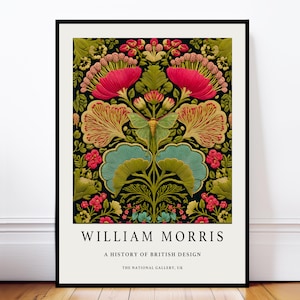 May include: A framed art print featuring a symmetrical floral design in shades of red, green, and teal against a black background. The print includes the text "WILLIAM MORRIS" and "A HISTORY OF BRITISH DESIGN".
