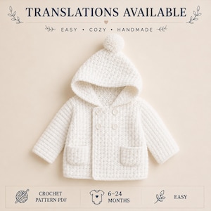 May include: A white hooded crochet jacket with a pom-pom on top, long sleeves, two front pockets, and four buttons. The text reads: TRANSLATIONS AVAILABLE, EASY, COZY, HANDMADE, CROCHET PATTERN PDF, 6-24 MONTHS, EASY. The design features a textured stitch.