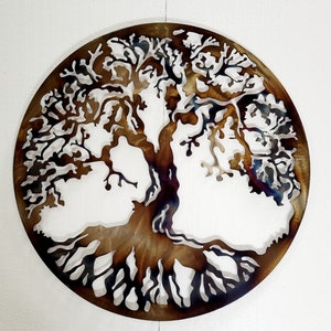 May include: A metal wall art sculpture of a tree of life with brown and black metal branches and roots. The tree is circular in shape and has a rustic, distressed look.