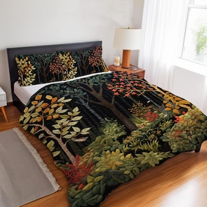 May include: A bedding set featuring a duvet cover and two pillowcases with a dark forest print. The design displays trees with autumn-colored leaves in shades of orange, yellow, and green against a black background, creating a dense woodland scene.