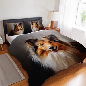 May include: A bedding set featuring a large, detailed portrait of a sable and white Shetland Sheepdog on the comforter and two matching pillowcases. The dog has long, flowing fur, a dark muzzle, and a friendly expression with an open mouth.