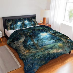 May include: A bedding set featuring a fantasy forest scene with large trees, a full moon, and a path. The duvet cover and pillowcases display a dark blue and green color palette with a whimsical, artistic design.