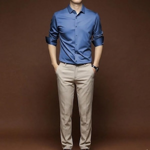 khaki pants blue dress shirt Khaki pants, blue shirt. Just great. More