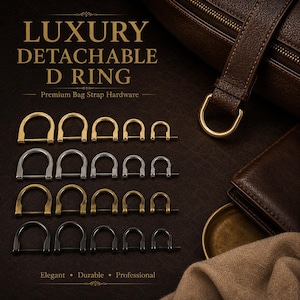 May include: A collection of twenty metal D-rings for bag straps arranged in four rows of five, featuring gold, silver, bronze, and black finishes. The text LUXURY DETACHABLE D RING Premium Bag Strap Hardware Elegant Durable Professional is visible.