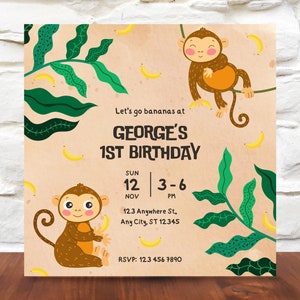 May include: A brown and tan birthday invitation with a jungle theme. The invitation features two monkeys, green leaves, and yellow bananas. The text on the invitation reads "Let's go bananas at GEORGE'S 1ST BIRTHDAY SUN 12 3-6 NOV PM 123 Anywhere St., Any City, ST 12345 RSVP: 123 456 7890".