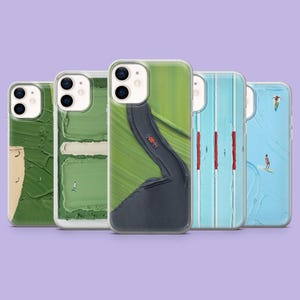 May include: Five clear phone cases with colorful abstract designs. The cases feature images of a golf course, a road, and a swimming pool. The cases are arranged in a row against a purple background.