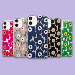 May include: A collection of five phone cases with floral patterns. The cases feature a variety of colors, including red, pink, gray, blue, black, and green. Each case has a clear border and a different flower design.