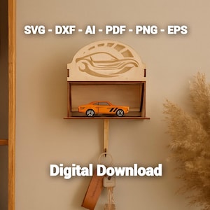 May include: Wooden key holder with a car-themed design. The key holder features a small orange car model on a shelf, with the text "SVG - DXF - AI - PDF - PNG - EPS" and "Digital Download".