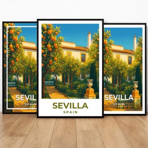 May include: Three framed art prints featuring a vibrant illustration of a Spanish villa with orange trees. The prints have a white border and the text "SEVILLA SPAIN" in a bold font. The artwork depicts a sunny day.