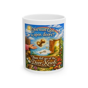 May include: White ceramic mug with a colorful illustration. The image features a hand reaching for a golden doorknob, with text that reads "You want God to open doors? Then let go of the Door Knob."