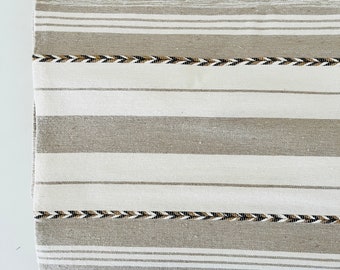 hand woven beige and cream organic cotton and linen blanket