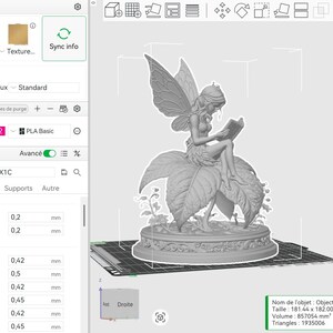 May include: A 3D model of a fairy figurine, seated and reading a book, atop a large leaf. The model is rendered in a light gray color, with intricate details visible. The image is a screenshot of a 3D modeling software interface.
