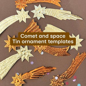 May include: A selection of gold and silver tin comet and star ornaments on a brown backdrop. The ornaments feature detailed embossed patterns and come in different sizes and shapes. The text "Comet and space Tin ornament templates" is displayed in a brown rectangle.