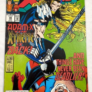 May include: X-Force comic book cover featuring Adam-X, with a sword, and the text "Adam-X The X-Treme is Back!" and "Things Have Never Been Deadlier!". The cover has a green, blue, and red color scheme.
