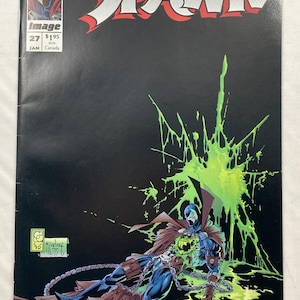 May include: Spawn comic book cover featuring a costumed character in a dark setting with green splatter. The title "SPAWN" is in red and white. The comic book is labeled "Image" with issue number 27.