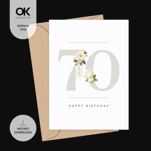 Op de afbeelding: Een verjaardagskaart met het getal 70 in lichtgrijs, versierd met witte rozen en de tekst "Happy Birthday". De kaart ligt op een beige envelop, met de tekst "Born in 1956" en "Instant Download" links.