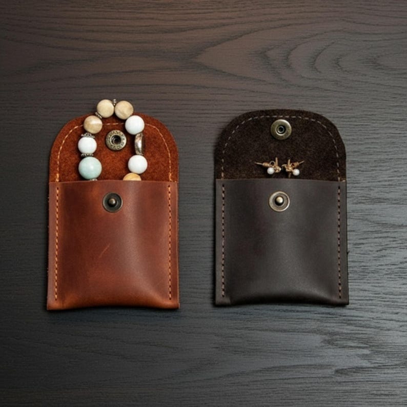 This Small Leather Jewelry Pouch is handmade from genuine leather and designed to store rings, earrings, and small jewelry safely. Compact and elegant, it works as a mini jewelry storage case or handmade jewelry travel pouch. Personalization options make it a custom jewelry pouch and a thoughtful gift for everyday use or travel.