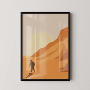May include: Framed art print with a minimalist landscape design. The image shows a silhouetted person in front of a mountain range and a setting sun. The colour scheme includes shades of orange, tan, and beige.