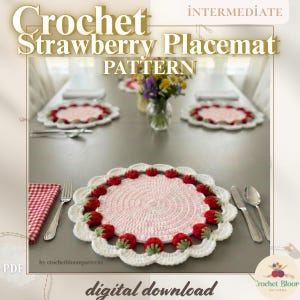 May include: A crocheted strawberry placemat pattern with a pink center and white scalloped edge, adorned with red strawberry accents. The text "Crochet Strawberry Placemat PATTERN" is displayed, along with "digital download".