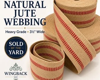 May include: Natural jute webbing rolls featuring a heavy grade texture and a width of 3 1/2 inches. The tan fabric is accented with two parallel red stripes running along the length. Text on the image reads Natural Jute Webbing, Heavy Grade, 3 1/2 inch Wide, Sold by the Yard, Wingback LLC, and Quality Materials, Beautiful Results.