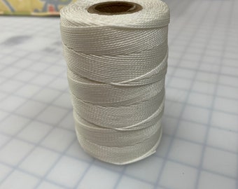 Button Twine for pulling and tufting buttons