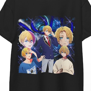 May include: Black t-shirt featuring a graphic design of a blonde-haired anime character in various poses. The design includes images of the character in a school uniform and casual wear, set against a blue and white background.