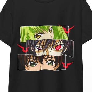 May include: Black t-shirt featuring a graphic of three sets of anime eyes. The top set has green hair and yellow eyes, the middle set has purple hair and a red eye, and the bottom set has brown hair and green eyes.