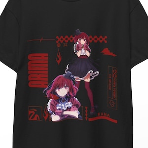 May include: Black t-shirt featuring a red graphic of an anime character with the name "ARIMA" in red vertical text. The design includes two illustrations of the character and additional Japanese text.