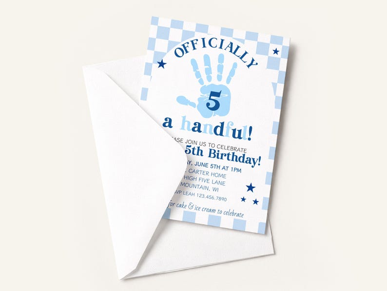 May include: A white envelope partially reveals a blue and white birthday invitation. The invitation features the text "OFFICIALLY a handful!" with a handprint and the number 5. Additional text includes the date, time, and location of the birthday party.