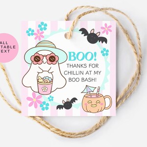 May include: A square gift tag with a cartoon ghost wearing sunglasses and a hat, holding a drink. The tag has the text "BOO! THANKS FOR CHILLIN AT MY BOO BASH!" with bats and flowers. The tag is attached to a twine string.