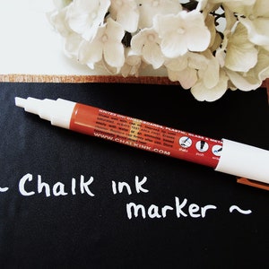 Marcador de tinta de tiza Bolígrafo blanco para pizarra, tablero de menú de cajero de escuela en casa para pizarra NO POROSA, vidrio o acero Borrado en húmedo Punta de cincel de 6 mm