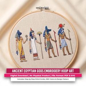 May include: An embroidery hoop containing a fabric panel with four embroidered figures of ancient Egyptian deities. The figures are depicted in profile, wearing traditional garments and holding symbols, rendered in blue, gold, red, and white thread.