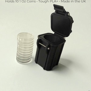 May include: A black coin holder with an open lid, next to a clear plastic coin tube. The holder is designed to hold 10 one-ounce coins. The text on the image reads: "Holds 10 1 Oz Coins • Tough PLA+ • Made in the UK". The PrintBROS logo is at the bottom.