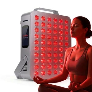 May include: A silver rectangular red light therapy device with a grid of circular red LED bulbs and a top handle. The side panel features a digital display screen with the text OhmRx Red Light Pro. The device is positioned upright.