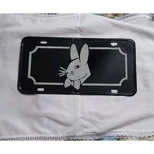 Vintage Playboy Bunny  Embossed Novelty License Plate Bow tie Bunny Used
