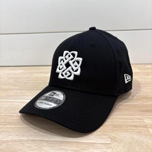 May include: A handmade wooden sign with the text "Welcome" in a playful font. The sign is painted white with a distressed finish, and features a small, decorative heart. It's designed for indoor or outdoor use.