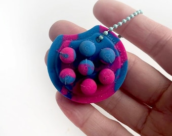 Drops Fidget Schlüsselanhänger - Lila & Blau - Glow-in-the-Dark Silikon Schlüsselanhänger