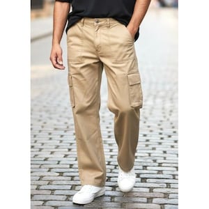 May include: Khaki cargo trousers with multiple pockets and a straight leg fit. The trousers are worn with a black top and white trainers. The trousers are made of a durable material.