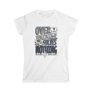 May include: White t-shirt featuring a graphic design with the text "OVERTHINKING SOLVES NOTHING" in gray and black. The design includes two cartoon robots and a cannabis leaf. The shirt is made of a soft, lightweight material.