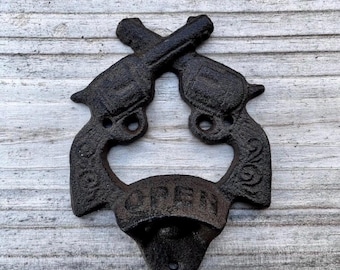 Abrebotellas doble de hierro fundido con forma de pistola para montaje en pared