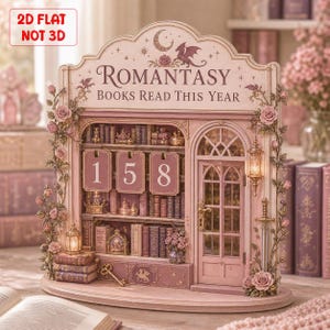 May include: A pink and cream-colored wooden bookshelf with the text "Romantasy Books Read This Year." The bookshelf features miniature books, a door, and decorative roses. The numbers "158" are displayed on the front.
