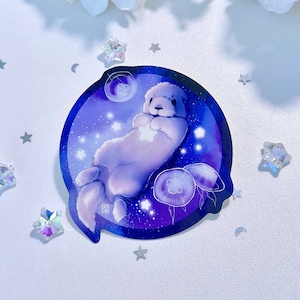 Celestial Sea Otter Holographic Sticker: Baby Otter in Space with Jellyfish