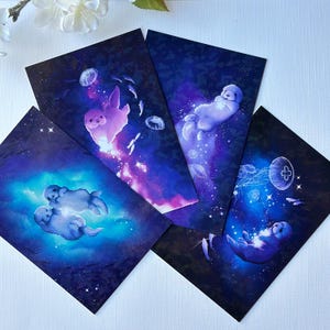 Jeu de cartes postales sur la loutre de mer interstellaire | mignonnes créatures marines et vie marine sur cartes holographiques de 10 x 15 cm (4 x 15 cm) | Adorable bébé loutre de l'espace
