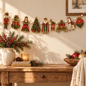 May include: A Christmas garland featuring a series of hanging ornaments including a nutcracker, stacked gift boxes, a queen, a decorated Christmas tree, a king, a trumpet banner, a royal carriage, a horse, and a red and green bauble.