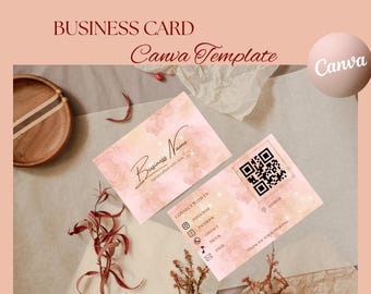 Op de afbeelding: Twee visitekaartjes met een aquarelontwerp in roze en perziktinten. De kaarten bevatten de tekst "Business Name" en een QR-code. De woorden "BUSINESS CARD" en "Canva Template" staan bovenaan.