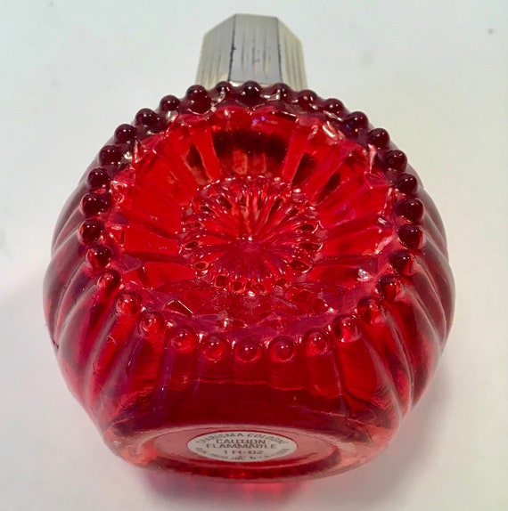 Avon Christmas Ornament with "Charisma" Cologne Gem