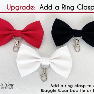 May include: Three bow ties with a silver ring clasp attachment. The bow ties are red, black, and white.